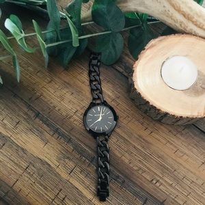 Women’s black Michael Kors watch